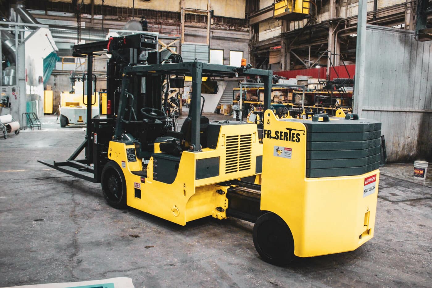 yellow forklift in warehouse