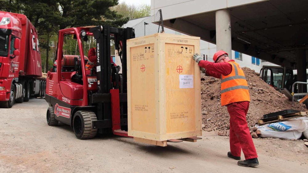 forklift carrying a crate